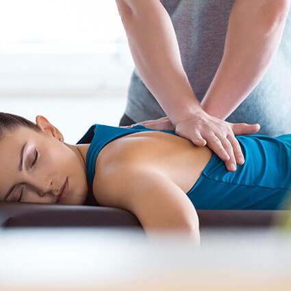 Person having their back adjusted